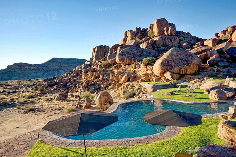 Pool, swimming area, canyon lodge in the rocks at Fish River Canyon, Fish River Canyon, tourism, stone hut, Namibia