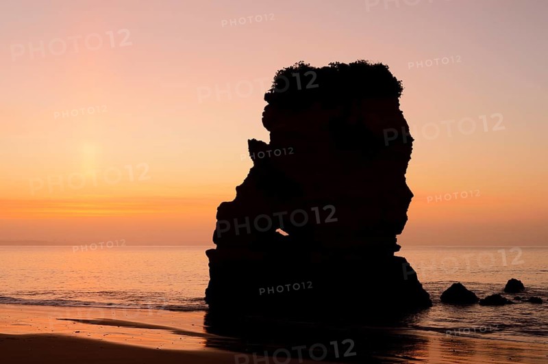 Rocks on beach at sunrise, Praia Dona Ana, Lagos, Algarve, Portugal
