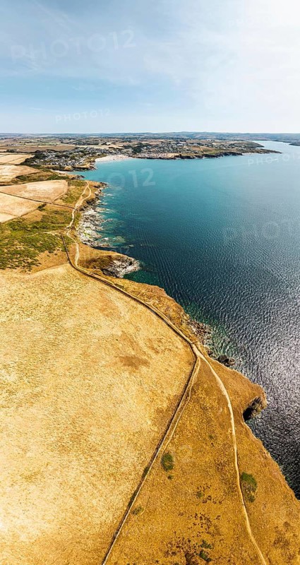 Panorama of Pentire Point and Bay over Padstow Bay from a drone, Polzeath, Cornwall, England, Summer 2026