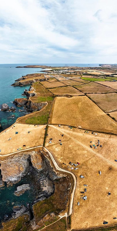 Panorama of Farms and Fields over Cliffs and Porthcothan Bay from a drone, Porthcothan, Padstow, Cornwall, England, United Kingdom, Summer 2026