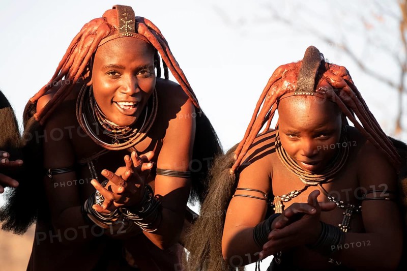 Himba woman dancing euphorically, traditional dance, traditional Himba village, Kaokoveld, Kunene, Namibia