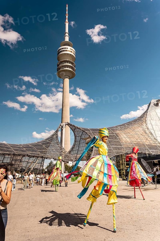 Artist of the zebra stilt show in front of the Olympic Tower at the Superbloom Festival in Munich's Olympic Park on 29.08.2026
