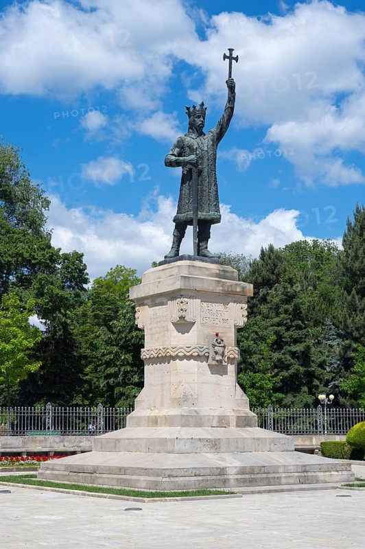Large monument with a statue of a man holding up a cross, Stephen the Great Memorial, Chisinau, Chisinau, Chisinau, Republic of Moldova, Moldova, Eastern Europe