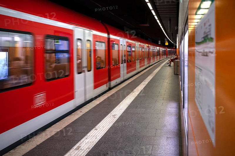 Underground incoming S-Bahn, train, platform, travelers, stop, train station, Munich transport and tariff network, MVV, public transport, movement effect, Munich, Bavaria, Germany