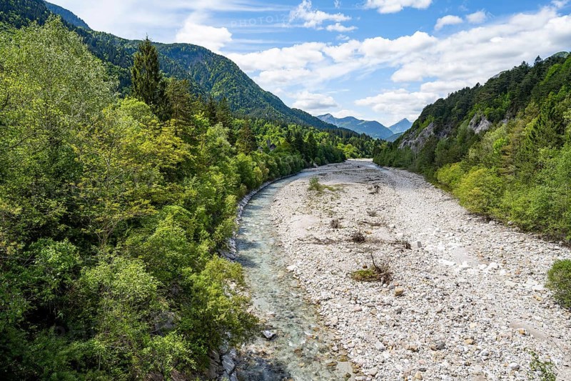 River Fella, canal valley, mountain landscape with peaks of the Julian Alps, Alpe-Adriatic cycle path, near Tarvisio, Friuli-Venezia Giulia, Italy