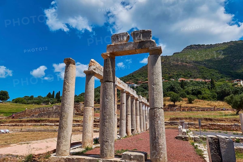 Ancient column formations along a stone path under blue sky, ancient site, archaeological site, Messene, Messini, Messinia, southwest of the Peloponnese, odyssey, Odyssey, Odysseus, Ulysses, film, filming location, Matt Damon, Peloponnese, peninsula, Greece