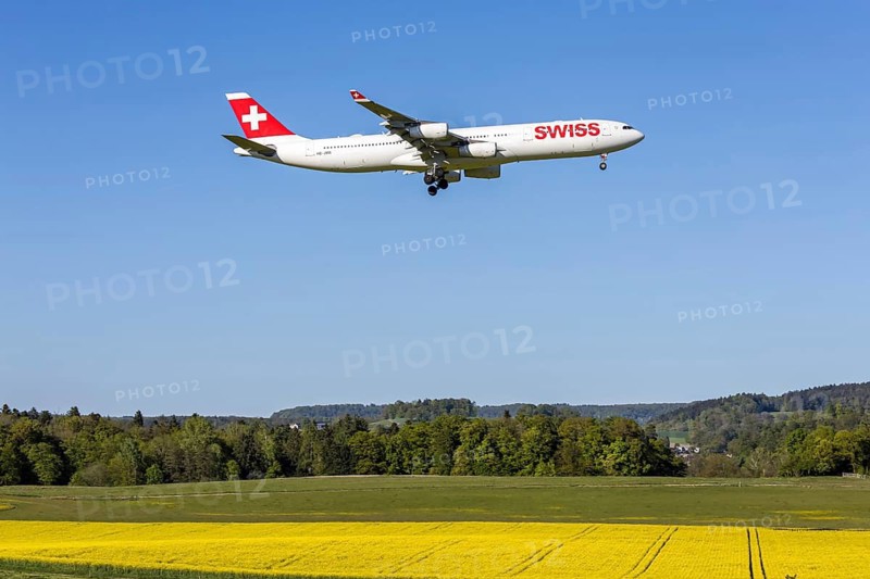 A Swiss Airbus A340-300 aircraft with the HB-JMB license plate at Zurich Airport, Switzerland