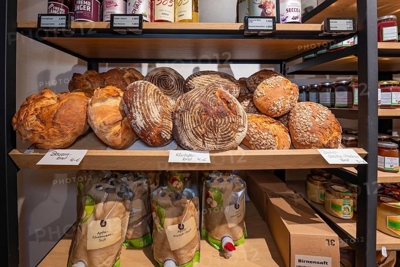 A shelf full of different types of bread and rolls in a bakery, baking bread, Haselstaller Hof, Gechingen, Calw district, Germany