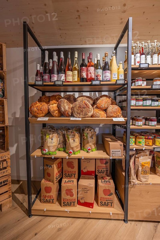Large shelf with breads, juice bottles and juice cartons in a grocery store, baking bread, Haselstaller Hof, Gechingen, Calw district, Germany