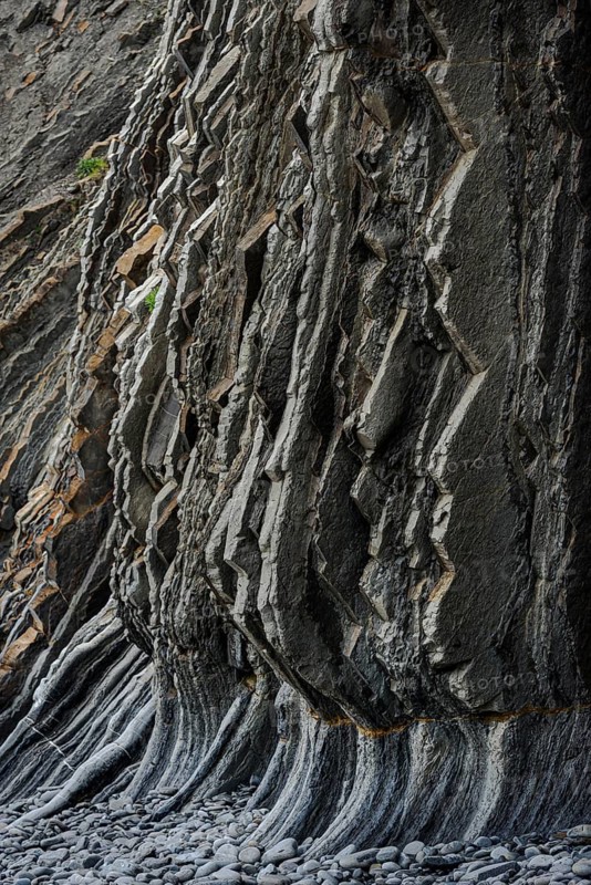 Geological formation of sandstone and limestone layers, Flysch on Itzurun Beach in Zumaia, Spain