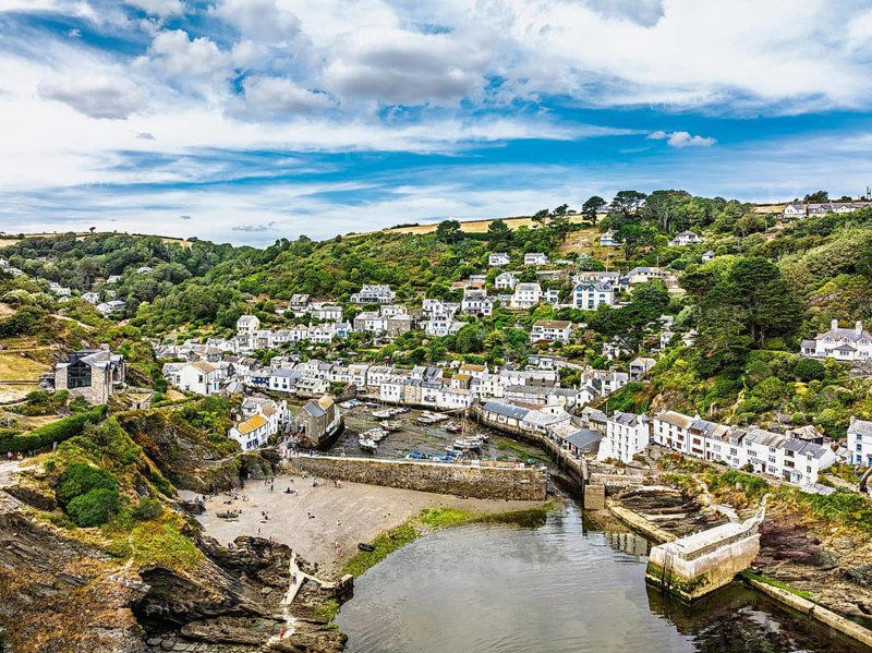Polperro Harbour and Village from a drone, Polperro, Looe, Cornwall, England, United Kingdom