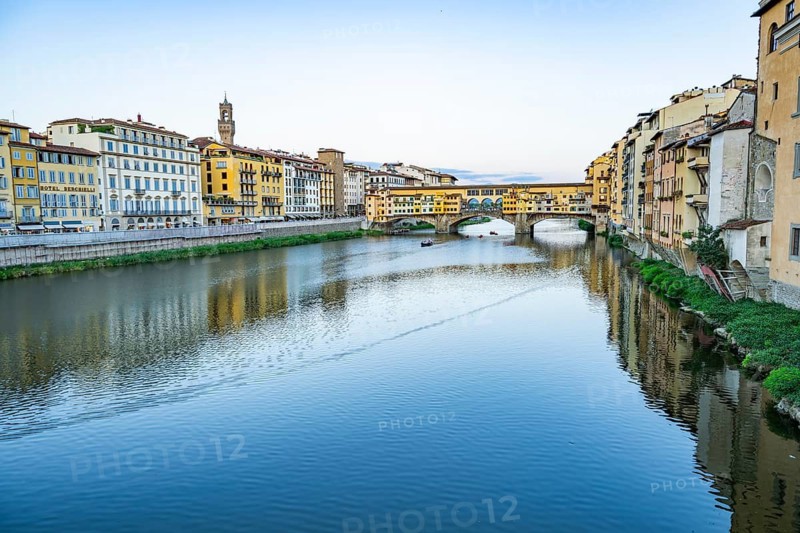 Ponte Vecchio bridge over Arno River at sunset, Florence, Tuscany, Italy
