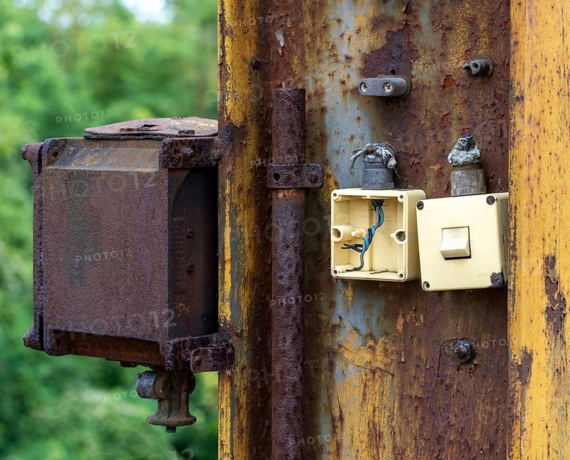Old plastic switches on a steel column at the Historic Cable Car Diversion Station in the Rüdersdorf Museum Park near Berlin, Brandenburg, Germany