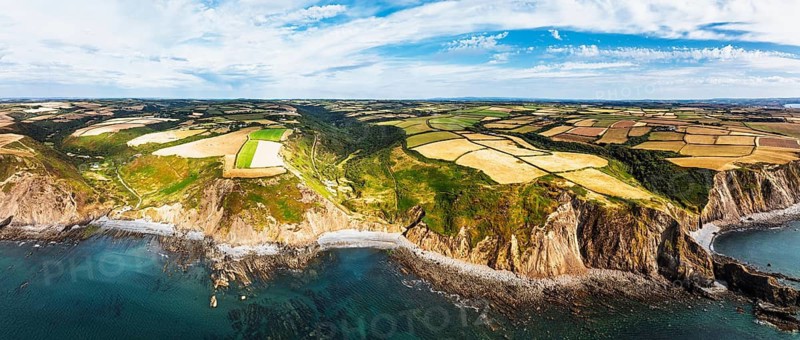 Panorama of Cliffs and Fields over Welcombe Mouth Beach from a drone, North Devon and Cornwall Coastpath Border, Devon, England, Summer 2026
