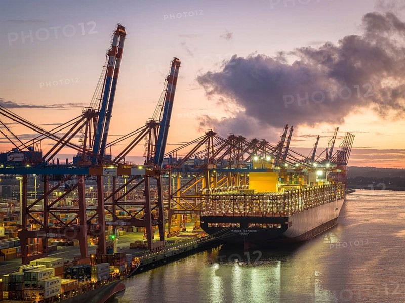 Aerial view at Waltershof harbour during the Blue Hour at the berths of Eurogate Container Terminal Hamburg (CTH) with the Manila Express (Hapag-Lloyd), Hamburg, Germany