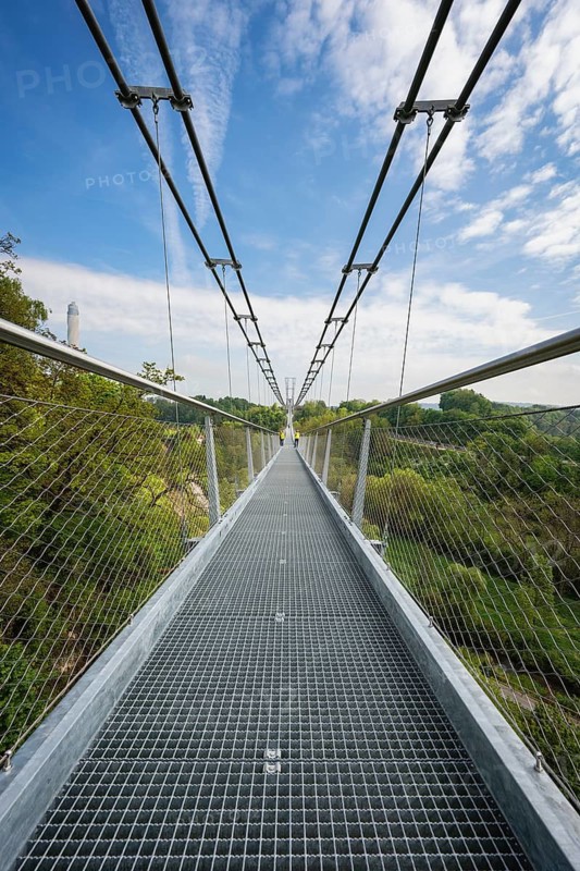 The Neckarline, a pedestrian suspension bridge up to 60 meters high with a wingspan of 606 meters above the Neckar Valley. The tourist attraction, built from a total of 444 tons of steel, serves to connect the historic old town and Bernese Field, where the 246 meter high TK Elevator test tower with the highest viewing platform in Germany is located. The Neckarline is the longest suspension bridge in southern Germany, Rottweil, Rottweil district, Baden-Württemberg, Germany