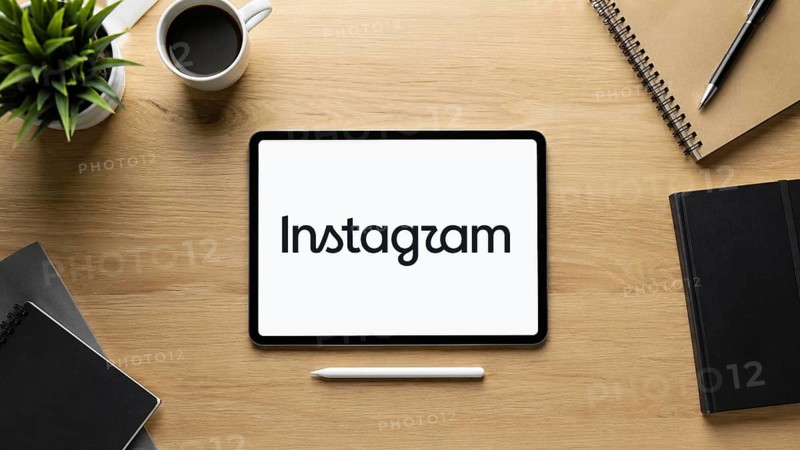 In this photo illustration, an iPad displays the new Instagram logo on a minimalist wooden office desk, in Delhi, India on 14 August 2026