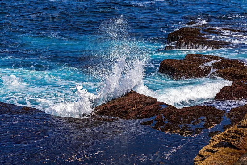 Waves crash into rocks on the coastline at Maroubra, Sydney, New South Wales, Australia
