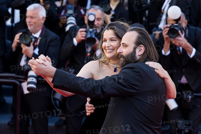 Laetitia Casta and Vincent Macaigne dance with Karma on the Red Carpet of the Palais des Festivals et des Congrès during the 79th Cannes International Film Festival. The 79th Cannes International Film Festival will take place from May 12 to 23, 2026