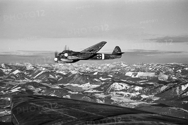 Historical aerial photograph of a Junkers Ju 88 on a combat mission over Russia, 1943, near Kalinovka