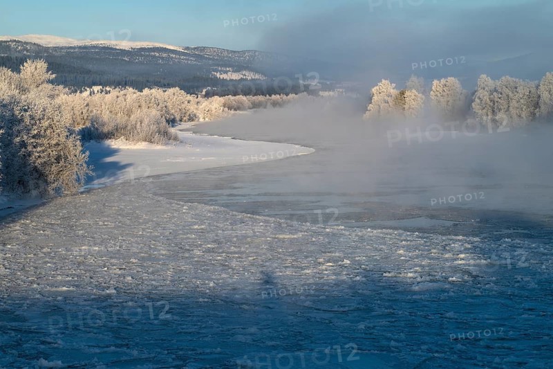 Fog over the freezing river Glomma (Glåma), Alvdal, Hedmark, Innlandet, Norway, February 2026