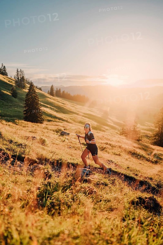 Summer trail running and hiking in the Alps on the Riedberg Pass between Obermaiselstein and Balderschwang in the Allgäu, Bavaria, Germany