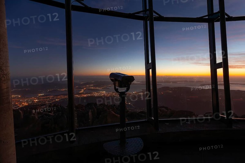 Glowing red sunrise over Mt. Wellington near Hobart in Tasmania, Australia
