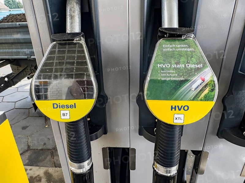 Fuel pump at gas station with left conventional diesel fuel right diesel HVO from hydrotreated vegetable oil hydrogenated hydrogenated vegetable oil synthetic paraffinic fuel made from renewable raw materials, Germany