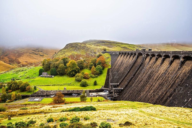 Autumn colors over Claerwen Dam, Claerwen Valley, Elan Valley Reservoir, Rhayader, Powys, Wales, UK