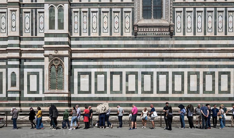 Mass tourism, overtourism, waiting in front of Santa Maria del Fiore Cathedral, Duomo by Filippo Brunelleschi, UNESCO World Heritage Site, Old Town, Florence, Tuscany, Italy