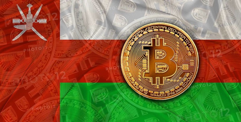 Investors in Blockchain Technology with Oman flag background. Bitcoin cryptocurrency with Omani flag