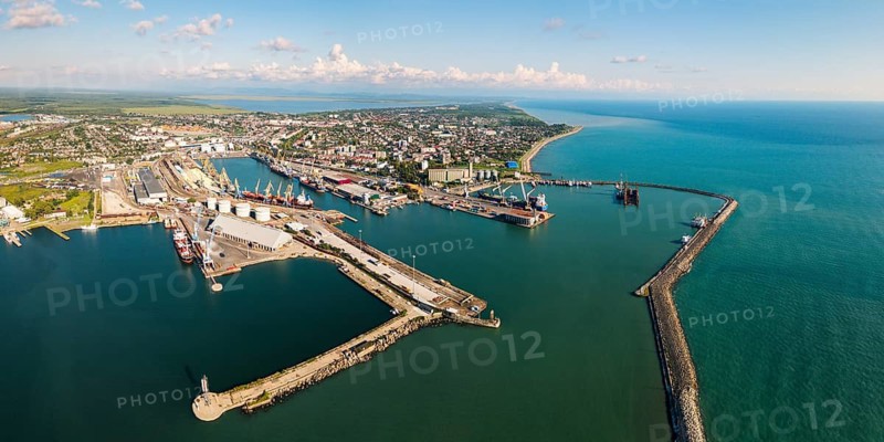 Aerial panorama Poti cityscape, black sea port, residential blocks, mixed uses, roads and parks, waterfront real estate, summer daylight panorama