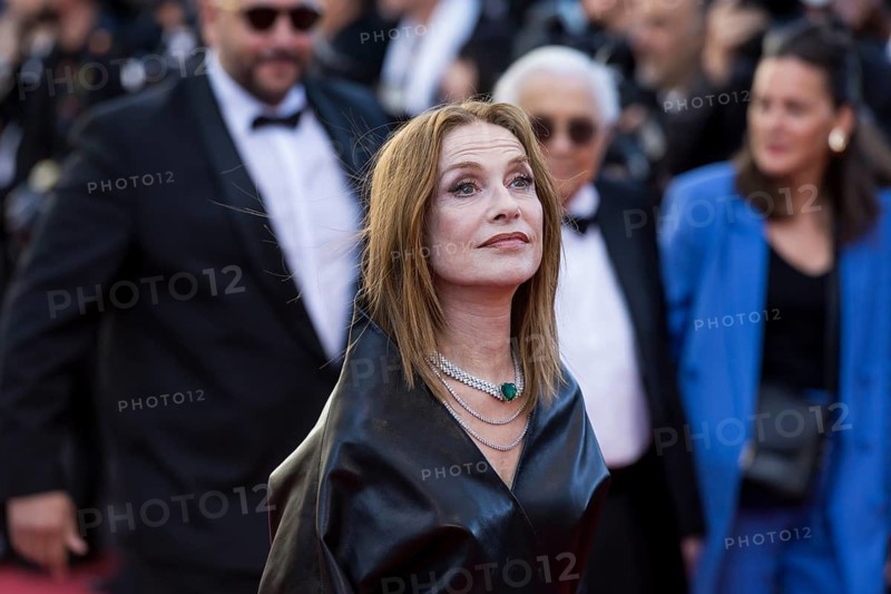 Isabelle Huppert with Karma on the Red Carpet at the Palais des Festivals et des Congrès during the 79th Cannes International Film Festival. The 79th Cannes International Film Festival will take place from May 12 to 23, 2026