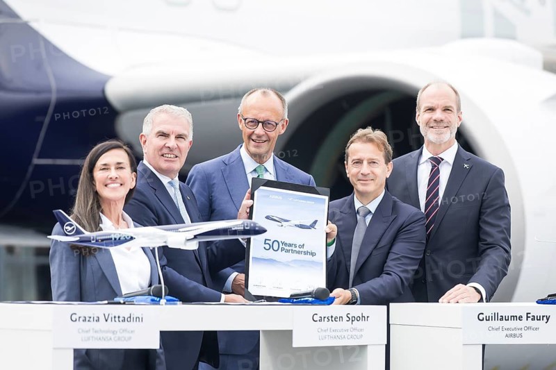 Grazia Vittadini (CTO of the Lufthansa Group), Carsten Spohr (CEO of the Lufthansa Group), Friedrich Merz (Chancellor of the Federal Republic of Germany, CDU), Guillaume Faury (CEO of Airbus) and Lars Wagner (CEO of Airbus Commercial Aircraft) during a tour of the ILA (International Aerospace Exhibition) on 10 June 2026 at the Berlin-Schönefeld Exhibition Centre