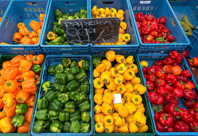 Yellow, green and red peppers (Capsicum) at a weekly market market, the Netherlands