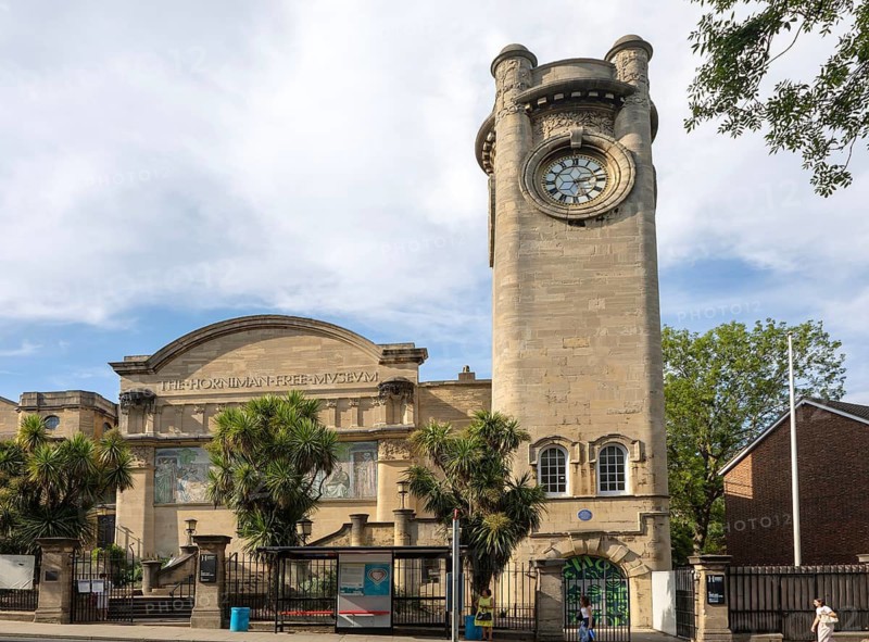 Clocktower and posters at the Horniman Museum building, Forest Hill, south London, SE23 England, UK