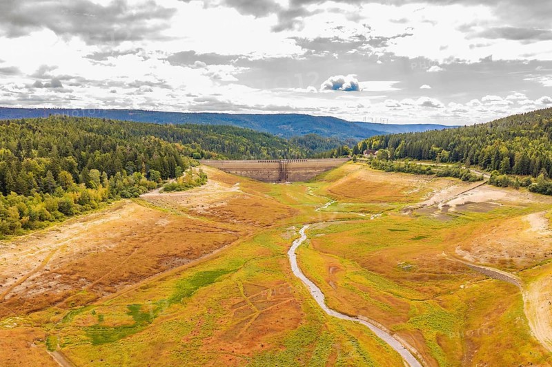 An extensive view over a valley with dam and meandering river, rehabilitation of the Schwarzenbach dam, Forbach, Black Forest, Germany