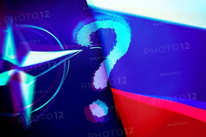 NATO and Russia flags with question marks, symbolic photo of standstill of Ukraine talks and tense security situation, photo montage +++ editorial use only