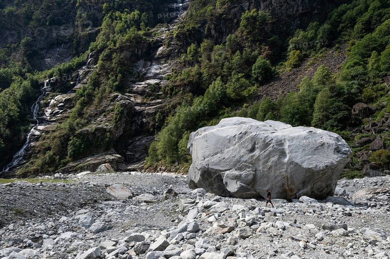 Large boulder lies in the Bavona River riverbed as a result of heavy rock and debris flow on the night of June 29-30, 2024 following heavy rains, hamlet of Fontana, Bavona Valley or Val Bavona, Maggia Valley, Tessin, Switzerland