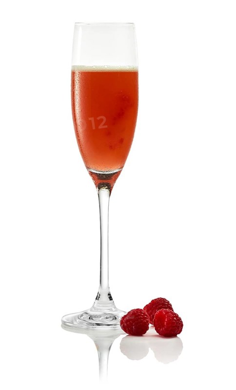 Raspberry cocktail in a champagne glass against a white background, raspberries as a garnish, studio shot