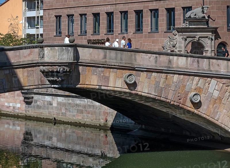 Detail, historic meat bridge built over Pegnitz in 1597, in the back the ox figure from the former slaughterhouse, Fleischbrücke, Nuremberg, Middle Franconia, Bavaria, Germany