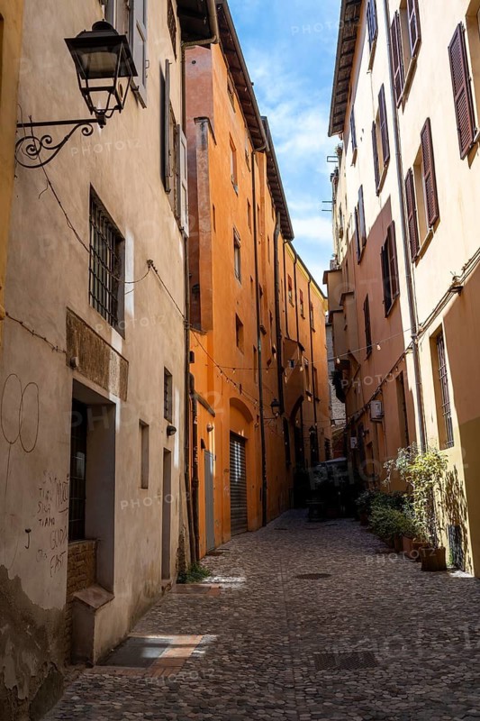 Small alley with colorful houses, old town, Bologna, Emilia Romagna, Italy