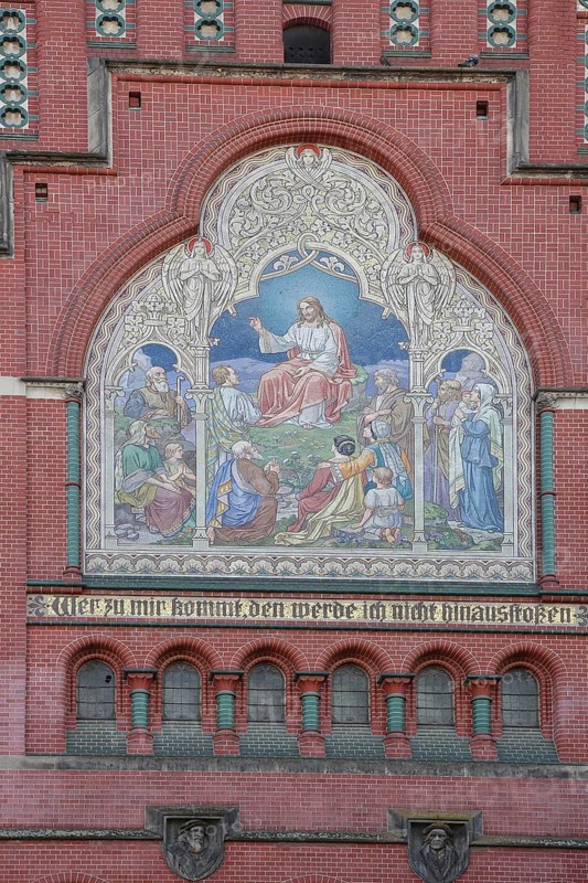 Wall mosaic with Jesus at the Sermon on the Mount and Bible quote, Whoever comes with, I will not push out, John 6, 17, inscription, handicrafts, Gothic Brethren Church, red brick church, Altenburg, Thuringia, Germany