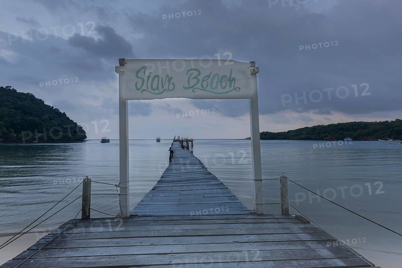 Jetty on Siam Beach in front of sunrise, Ko Kut or Koh Kood, Gulf of Thailand, Thailand