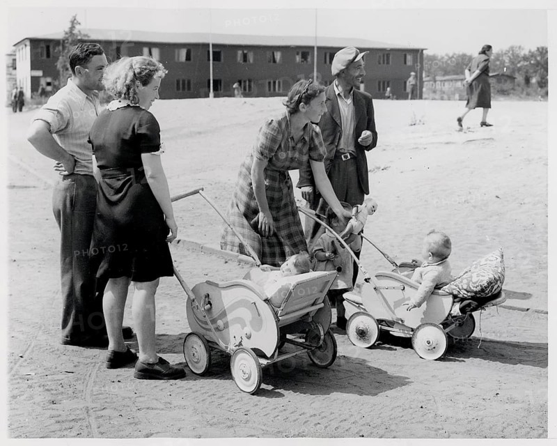 Jews, displaced persons, Berlin Düppel, displaced camps, Jewish families, end of war, group of adults with strollers outside a building, 19.8.1946