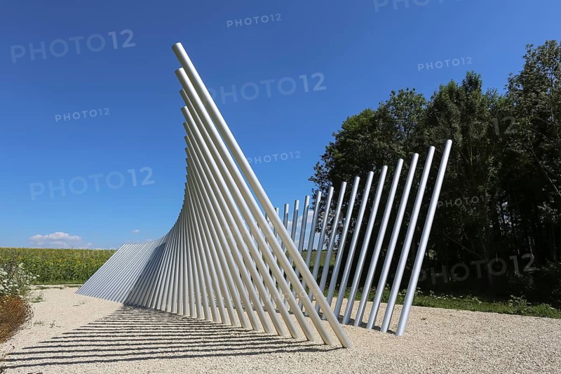 Art in public space, sculpture made of aluminum profile pipes by artist Martin Burchard, life's horizon path near Mundingen, light and shadow, gravel, clouds, blue sky, walk-in art, paths of reflection and refreshment on the Ehinger Alb, Baden-Württemberg, Germany