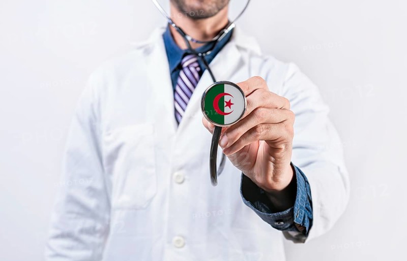 Algeria healthcare system, doctor holding stethoscope. Algeria health and medical insurance concept