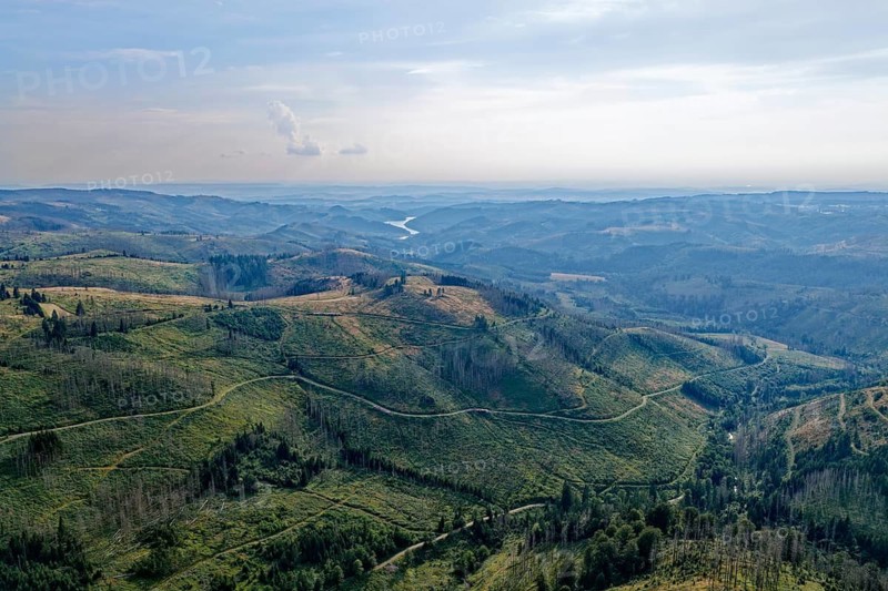 Mountain landscape in the Harz nature park Park, and in the distance the Sösestausee. aerial view. Harz, Landkreis Goslar, Lower Saxony, Germany