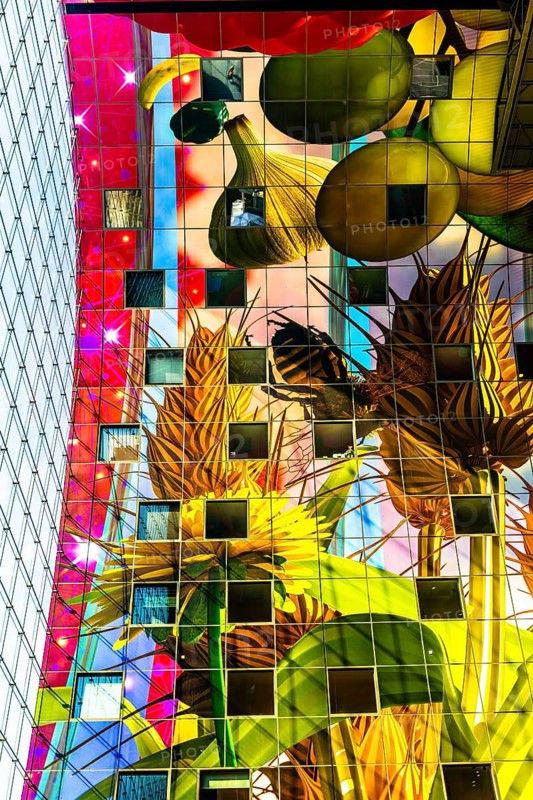 Markthal from 2014, offers over 100 food stalls and delicatessens with spectacular ceiling fresco cornucopia, Horn of Plenty by Arno Coenen and Iris Roskam, Rotterdam, the Netherlands
