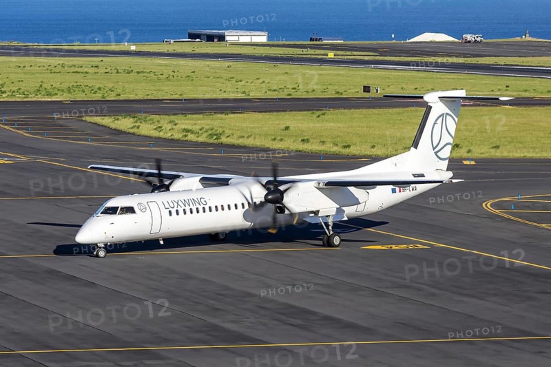 A Luxwing Bombardier Dash 8-Q400 aircraft with the license plate 9H-LWA at Ponta Delgada Airport, Portugal